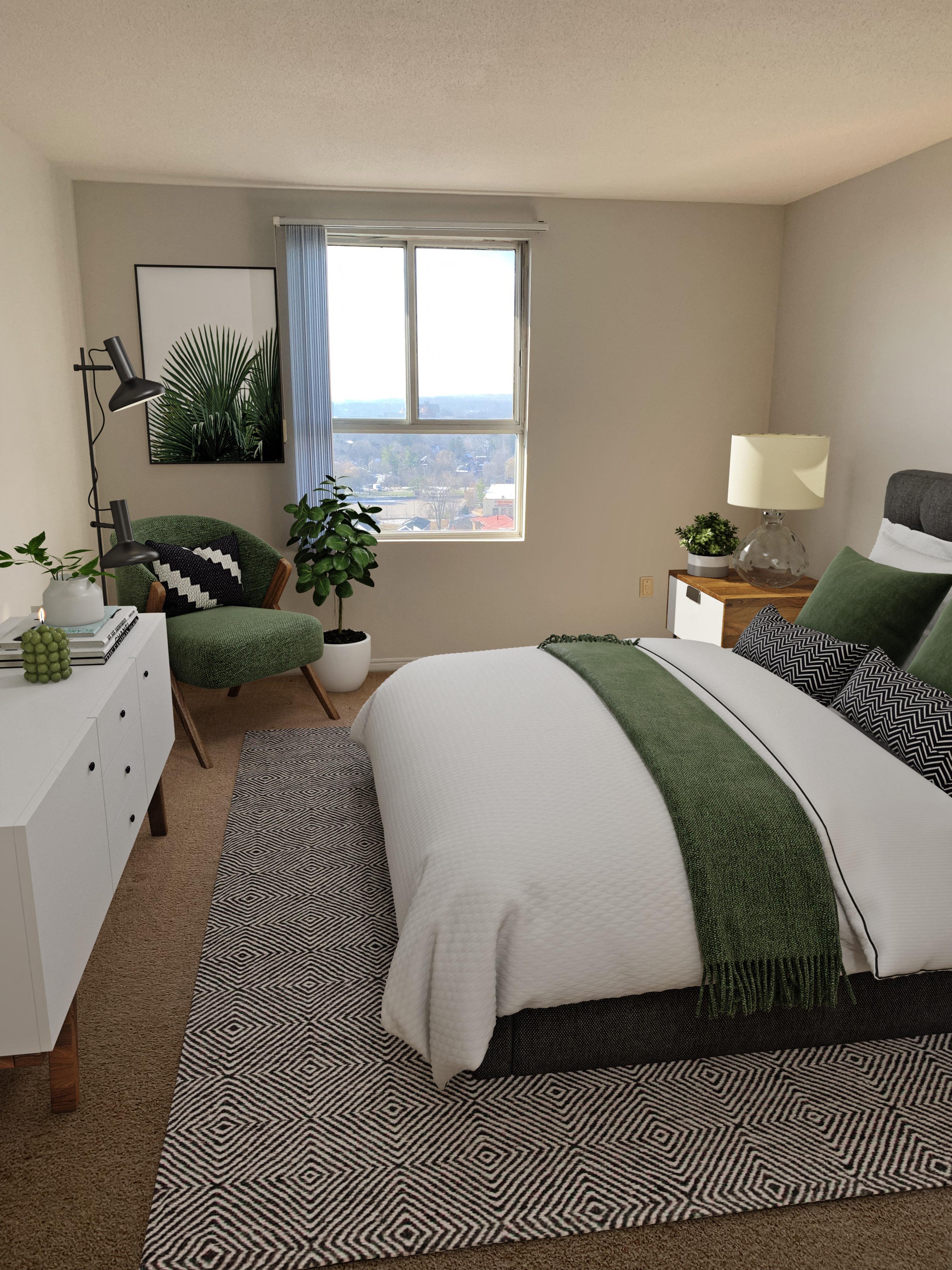 a bedroom with a bed and a white dresser and a window